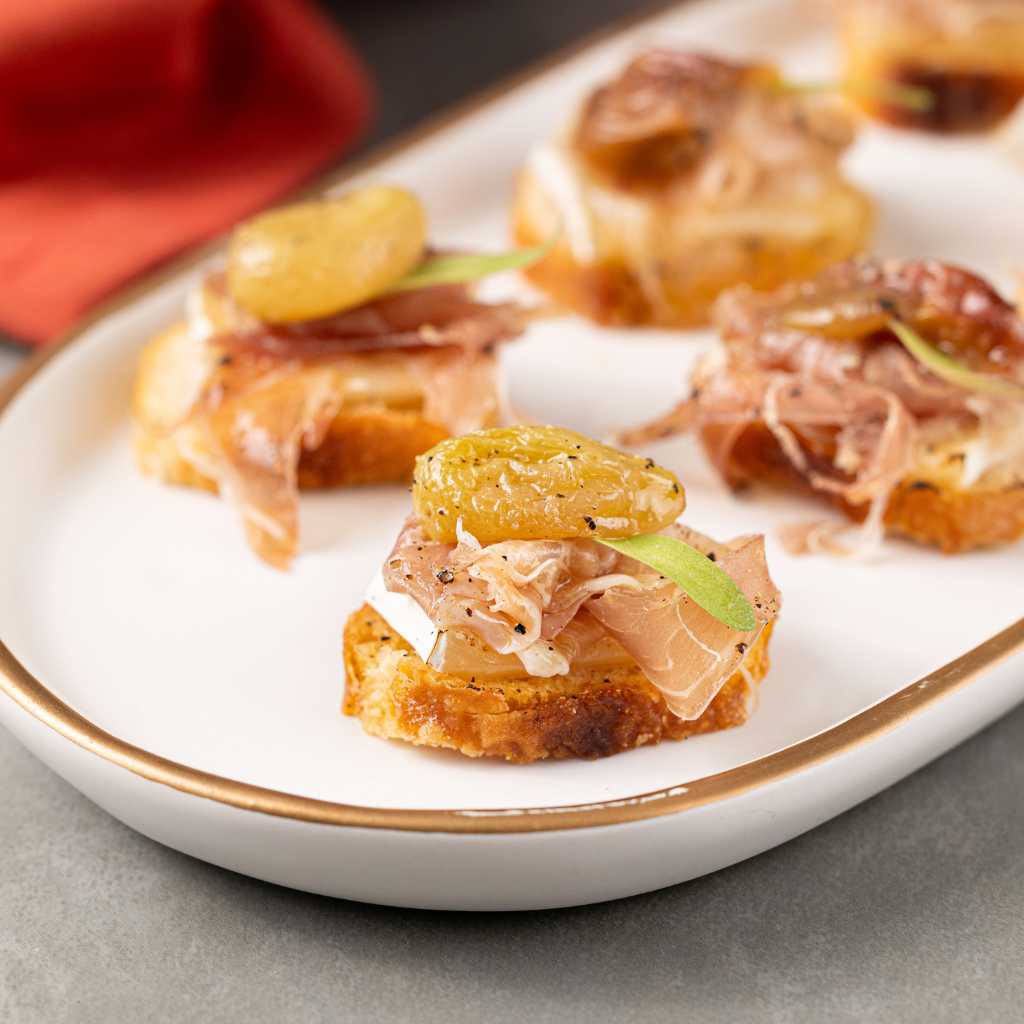 Canapé de Brie,com Parma e Uva Confitada